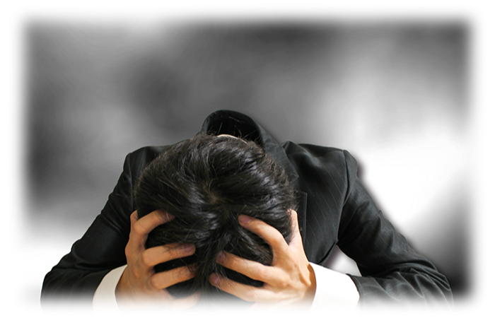 童顔で落ち込む男性